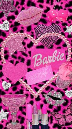 some pink and black items are arranged in the shape of a heart on a leopard print background