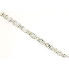 Royal 14K White Gold Tennis Bracelet with Alternating Round and Baguette Diamonds - 6.6 Carat Total Diamond Weight Luxury Baguette Diamond Evening Jewelry, Gold Tennis Bracelet, Diamond Jewelry Set, Baguette Diamonds, Bracelet Design, Radiant Diamond, Baguette Cut Diamond, Royal Jewelry, Baguette Cut