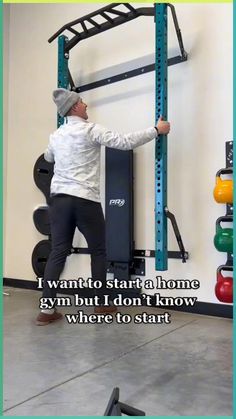 a man standing in front of a gym equipment rack with the words, i want to start home gym but i don't know where to start