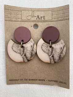 Earrings, Sally, African Style Original earrings with a print of my drawing of Sally. Printed on "super wood" mfd and then Laser cut before assembly. The earring is nickel free. The earring is 4cm.  Made locally in George, South Africa.  By purchasing this product you support a job creation project for women in South Africa. The herd's story: The Knysna Elephant Park in South Africa was established in late 1994 when the Withers family set out to rescue two orphaned elephants from Kruger National George South Africa, Harry And Sally, Elephant Park, Style Africain, Knysna, Elephant Earrings, Paper Jewelry, African Style, Family Set