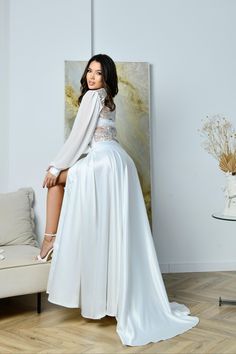 Long bride robe for wedding day is the perfect complement to your wedding attire. Its elegant and luxurious design will accentuate your beauty, and its long train will add sophistication and charm to you.  Bridal kimono robe with train for wedding day Lace bride robe with train Made from high quality satin, this  Lace bride robe will keep you comfortable and comfortable on your wedding day. It fits nicely on the body, emphasizing your figure and giving you grace.  Bride lace robe with train for bride Also, on the back of this wedding kimono robe, the lace and sequin embellishment adds extra charm and sparkle. You will look flawless as a snow queen, drawing the attention of all the guests at your special event.  Bride robe for wedding day  Long bridal robe with train  Bridal robe for bride Elegant Bridesmaid Gown With Sheer Bodice, Feminine Wedding Dress With Satin Finish, Bridal Gown With Lace Back, Bride's Gown With Lace Back, Elegant Dresses With Lace Sleeves For Wedding Night, Elegant Wedding Night Dress With Lace Sleeves, Satin Bride Dress Floor-length, Floor-length Satin Bridal Dress, Floor-length Satin Bride Dress