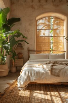 a bed sitting in a bedroom next to a window with bamboo blinds on the windowsill