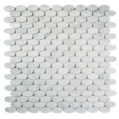 a white tile with circles in the middle and one circle at the bottom, on a white background