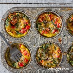 muffin tins filled with different types of breakfast foods, including eggs and spinach