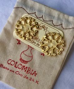 "This piece was hand-picked during my recent trip to Bogotá, Colombia.  For the people of ancient Colombia, Gold had a profound symbolic value. With its colour and radiance, an analogy with the sun was established. The golden disc, the father of Gold, and a powerful symbol of fertility. \"The sun is the radiance of God's glory and the exact representation of his being, sustaining all things \"  Each piece of jewelry in this unique collection features genuine gemstones set in 24k gold over bronze/brass and tells the time honored story of the native Colombian artisans and their incredible past that continues to evolve today. Join the journey to Colombia! Componets: Base in an alloy of metals with double plating of 24k gold. Each earring is a perfect circle measuring 1\" diameter Original Pre Colombian Jewelry, God's Glory, Perfect Circle, Precious Jewels, A Perfect Circle, Telling Time, The Father, Screw Back Earrings, Artsy Fartsy