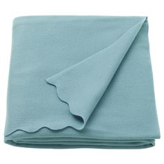 a blue blanket folded on top of each other