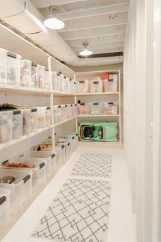 a room filled with lots of shelves and bins