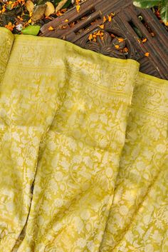 The Banarasi Shikargah saree is a masterpiece of craftsmanship, blending the elegance of Banarasi silk with intricate motifs inspired by the royal hunting scenes. Adorned with finely woven animals, birds, and floral patterns, these sarees exude opulence and heritage, making them a timeless choice for special occasions and celebrations. ﻿Click here to view the underskirt Silk Banarasi Saree, Saree Banarasi, Banarasi Silk Saree, Indian Textiles, Katan Silk, Banarasi Saree, Silk Yarn, Silk Thread, Floral Motifs