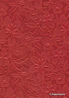 red fabric with flowers and leaves on it