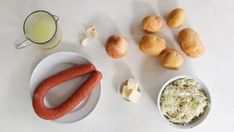 some food is laying out on a white table