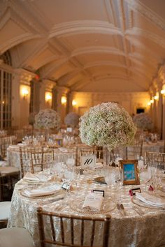 the tables are set for an elegant wedding reception