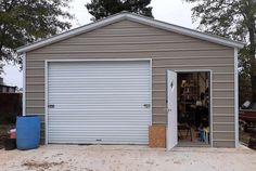 two garages with one door open and the other closed