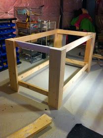 an unfinished table in the process of being built