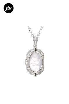 White Mother-of-Pearl Doublet with 0.08ctw White Zircon Rhodium Over Sterling Silver Locket Pendant w/Chain. Pendant measures approximately 1 1/8" L x 5/8" W and has a 1.5mm bail. Singapore chain measures approximately 18 inches in length, 1/32 of an inch in width with a lobster claw clasp closure and a 2-inch extender. Colors, shapes, and sizes may vary. Accent stones primarily zircon. Formal Mother Of Pearl Jewelry With Pearl Charm, Classic Pearl Charm Jewelry In Mother Of Pearl, Classic Mother Of Pearl Jewelry With Pearl Charm, Elegant Oval Pendant Locket Necklace, Elegant White Oval Pendant Locket Necklace, Elegant Round Locket Necklace For Formal Occasion, Elegant Formal Round Locket Necklace, Elegant Wedding Locket Necklace, Elegant Silver Mother Of Pearl Jewelry