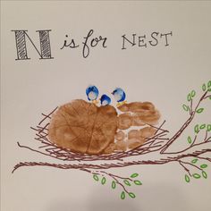 a child's handprint with two little birds on it and the words n is for nest