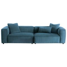 a blue couch with two pillows on it and one pillow is folded over the back