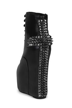 Lace-up platform wedge boot with spiked cross detail Fits true to size Measurements taken from size 7 6.5" Heel, 2.5" Platform Leather Upper, Leather Lining, Synthetic Sole Zipper & Lace-up closure Odd Fashion, Flat Wedges, Cork Sandals, Closed Toe Sandals, Platform Stilettos, Platform Wedge, Toe Sandals, Pump Sandals, Platform Wedges