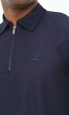 QL Relaxed Polo Zip Up S24 in Navy Blue Description: Navigate the warmest months in style by adding QL Relaxed Polo Zip Up S24 to your summer wardrobe. Made from breathable slightly elasticated ribbed fabric perfect for the hot weather. It is very versatile and can be dressed up for a business casual look or dress down for the weekend allowing you to transition from a casual to a semi-formal look effortlessly. Modern Islamic clothing for men High quality ribbed fabric Classic polo shirt with a s Blue Cotton Top With Zipper Closure, Blue Cotton Tops With Zipper Closure, Blue Casual Top With Zipper Closure, Casual Blue Top With Zipper Closure, Modern Islamic Clothing, Islamic Clothing, Formal Looks, Hot Weather, Casual Look