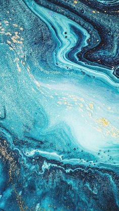 an abstract painting with blue and gold paint on the bottom, it looks like marble