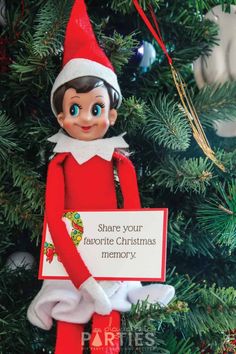 an elf ornament hanging on a christmas tree with the message share your favorite christmas memory