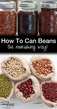 four bags filled with beans sitting on top of a table next to jars full of beans