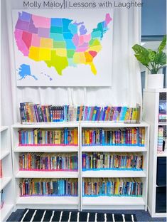 a book shelf filled with books in front of a map