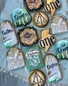 harry potter themed cookies are arranged on a table