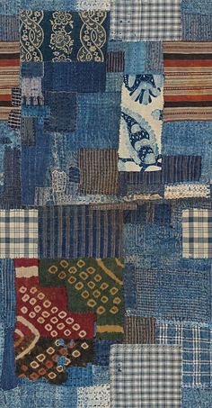 a patchwork quilt with many different colors and designs on it's sides, including blue