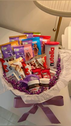 a basket filled with lots of different types of candy