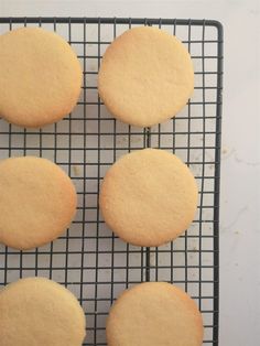 four cookies on a cooling rack ready to be baked in the oven or used as an appetizer