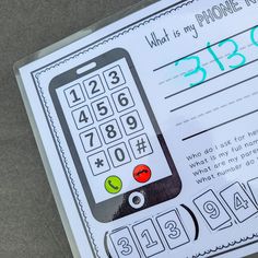 a close up of a cell phone on top of a paper with numbers and times