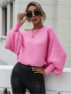 Our Gisele Top comes in a gorgeous neon pink tone, It features a high neckline and lantern long tighten cuff sleeves offering a relaxed and comfort fit. Pair with your favourite pair of chinos for a classy winter look! Size Guide: Melina is 5’6” tall, and has a 33.5” bust, 24.8”waist, & 37.4” hips. She is wearing a S / US 4 / AU 8. This knit top is true to size. Material: 50% Acrylic, 30% polyamide, 20% polyester. Key Features: High neckline. Pull on style. Lantern fit sleeve. Care Instructions: Office Sweater, Solid Color Sweater, Dolman Sleeve Sweater, Bat Sleeve, Bateau Neck, Chic Bedroom, Loose Sweater, Cozy Sweater, Winter Clothes