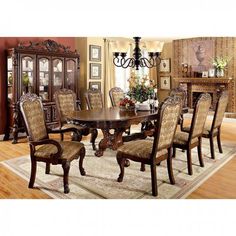 a formal dining room table and chairs set