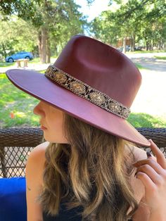 "Maroon faux Leather Fedora with Rhinestone, Pearl and Chain Hat Band. Great addition to a summer or fall wardrobe. Made in Texas. 4\" Brim Medium size: 56cm-59cm" Elegant Embellished Hats For Festival, Elegant Rhinestone Hats For Festival, Elegant Rhinestone Festival Hats, Womens Fedora, Formal Attire, Hat Band, Fall Wardrobe, Sun Hats, Fedora