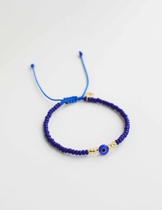 The evil eye is used throughout cultures as a symbol of protection against negative energies. This seed bead bracelet style has quickly become a top favorite. Basically, a must have. Macramé style bracelet Royal Blue Seed Beads Thread Color: Dark Blue Adjustable from 3-5 inches in diameter 100% handmade, therefore slight variations may occur Evil Eye Bead Bracelet Gift, Adjustable Beaded Bracelets With Evil Eye For Friendship, Blue Evil Eye Bracelet With Tiny Beads For Gift, Blue Evil Eye Bracelet With Tiny Beads As Gift, Adjustable Blue Evil Eye Bracelet Hand-strung, Blue Evil Eye Bracelet With Spacer Beads, Adjustable Evil Eye Beads For Gifts, Adjustable Evil Eye Beads As Gift, Blue Beaded Spiritual Friendship Bracelets