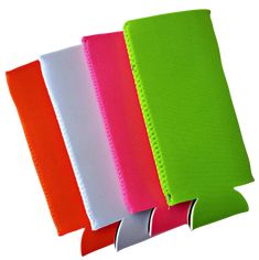 four different colored notebooks lined up next to each other