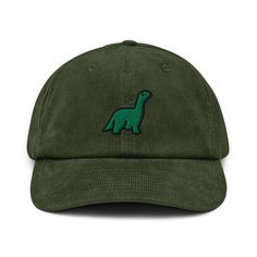 Show off your love for dinosaurs with our bold and fun Dinosaur Baseball Cap. This versatile accessory is suitable for both kids and adults, with an adjustable strap to ensure a comfortable fit for all ages. The wide brim provides ample shade from the sun, making it perfect for outdoor activities. Order now and roar with style wherever you go! * 100% cotton corduroy * Soft, unstructured crown * Cotton twill sweatband and taping * Adjustable buckle 🌿 Eco-Friendly Production ✈️ Ships Internationa Dad Style, Embroidered Corduroy, Corduroy Hat, Mushroom Hat, Hat Handmade, Dad Cap, Embroidered Caps, Embroidered Baseball Caps, Corduroy Fabric