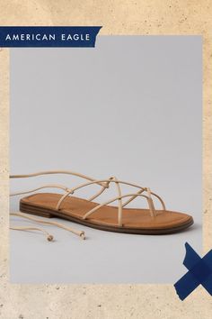 Vegan leather upper/Thong construction/Lace-up closure/Rubber outsole Beige Leather Lace-up Sandals With Round Toe, Spring Lace-up Sandals With Leather Footbed And Flat Heel, Lace-up Sandals With Leather Footbed For Spring, Adjustable Flat Leather Lace-up Sandals, Spring Lace-up Sandals With Leather Footbed, Casual Lace-up Sandals With Single Toe Strap For Spring, Strappy Lace-up Sandals With Leather Sole For Spring, Casual Leather Toe Post Lace-up Sandals, Adjustable Cushioned Lace-up Sandals For Spring