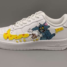 "Customize your kicks with the Nike Air Force 1 Cartoon Character Custom. Express your personality with a one-of-a-kind design featuring your favorite cartoon character. Expertly crafted for comfort and durability. Upgrade your sneaker game today." ★ Brand new with box ★ Each pair is unique and one of a kind ★ Each pair is personally handmade, painted with high quality Angelus. ★ Leather acrylic paint. Topped with a clear coat for extra protection. ★ Available in all sizes including men and wome Sporty Sneakers With Character Print For Streetwear, Casual Custom Sneakers With Character Print For Streetwear, White High-top Sneakers With Cartoon Print, Sporty High-top Sneakers With Character Print, Cartoon Print Sneakers For Streetwear, White Cartoon Sneakers For Streetwear, Cartoon Print Sneakers With Round Toe, Cartoon Low-top Sneakers For Streetwear, Cartoon Style Low-top Sneakers For Streetwear