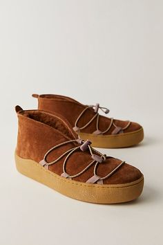 A cozy, rustic style meets modern design elements with these low-ankle booties, featuring a shearling lining with bungee fastening for a techy touch. **Features:** Slip-on style, low-ankle length, suede uppers, shearling lining, bungee laces with adjustable toggle, platform crepe rubber sole **Why We | Snowdrop Micro Mukluk Boots by FP Collection at Free People in Burnt Caramel Suede, Size: US 7 Mukluk Boots, Dust Bunny, Artisan Craft, Vintage Aesthetic, Boot Shop, Rustic Style, Boho Outfits, Ankle Booties, Ankle Length