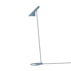 a white floor lamp with a blue shade on the top and one light on the bottom