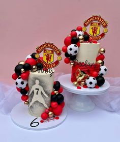 two cakes decorated with soccer themed decorations