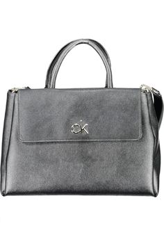 Indulge in the epitome of sophistication with this Calvin Klein masterpiece—a testament to pristine craftsmanship and eco-conscious luxury. The black handbag exudes a bold and contemporary aura, effortlessly elevating the fashion quotient of any ensemble. It features dual handles complemented by an adjustable and removable shoulder strap, offering versatility whether you’re on-the-go or aiming for a more structured look. An external pocket grants easy access to essentials, while an internal one secures your treasures. The snap closure ensures everything is tucked away safely, with the iconic Calvin Klein logo serving as a subtle yet powerful statement of style. Step into sustainable fashion without compromising on elegance. – Color: Black – Material: 25% Polyester, 22% Polyethylene, 51% PO Chic Logo, Calvin Klein Black, Leather Hobo, Black Handbags, Leather Accessories, Satchel Bags, Pebbled Leather, Givenchy, Bags Handbags