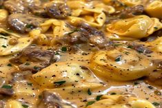 pasta with meat and sauce in a skillet