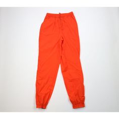 Vintage 90s Streetwear Mens Small Blank Cuffed Nylon Joggers Jogger Pants Orange Mens Pants Blemish back left bottom, top Mens size Small Measurements are: 13 inches across the waist laid flat 32 inch inseam 44 inches from top to bottom Orange Nylon US Shipping is FREE Canada is $15 and International is $24 Check out my other items in my store! PR2038 90s High Waist Parachute Pants For Streetwear, 90s High-waisted Parachute Pants For Streetwear, Summer Streetwear Nylon Parachute Pants, 90s High Waist Cargo Pants, Casual Orange Joggers For Streetwear, High Waist Solid Joggers For Streetwear, 90s High Waist Parachute Pants For Spring, High-waist Solid Joggers For Streetwear, High-waist Nylon Parachute Pants With Elastic Waistband