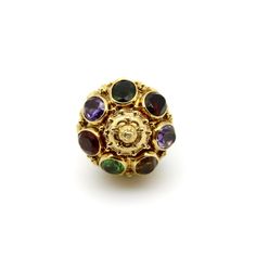 This is part of Chairish's Fine Jewelry assortment.   This vintage 18k gold Italian lantern charm is encrusted with citrine, amethyst, garnet, tourmaline and turquoise, bezel set among Etruscan Revival wirework and granulation. The ornate vintage piece was most likely first purchased at the Ponte Vecchio, a bridge in Florence famous for its jewelry shops and decadent baubles. The charm is oversized—the largest we’ve come across in this style. Layered like a wedding cake, the bottom tier contains Luxury Gold Multi-stone Gemstones, Heirloom Multi-stone Yellow Gold Gemstones, Luxury Yellow Gold Gemstones For Jewelry Making, Gold Byzantine Multi-stone Jewelry, Gold Byzantine Jewelry With Multi-stone, Large Lantern, Crystal Geode, 1960s Vintage, Bezel Setting