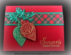 a christmas card with an ornament on it