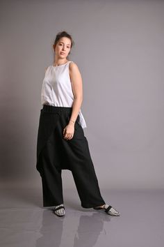 Linen Pants, Harem Pants, Beige Pants ◾ Black LINEN pants. Loose harem pants. Summer comfortable quality linen pants. Natural linen pants. The pants are very comfy. These pants are both sports and everyday.  You can go to work with them, you can also wear them in the free days. They have a sporty elegant style.  Loose fitting. ✂ Fabric: 100% lINEN Model wearring size S. Heigth: 176 cm- 5"8 inches Fabric: ►Quality NATURAL linen fabric. medium weight (200 g) linen fabric Model wearring size S. ◾ T Baggy Ankle-length Pants For Festival, Baggy Wide Leg Festival Pants, Bohemian Black Straight Pants, Black Bohemian Straight Pants, Bohemian Baggy Straight Pants, Baggy Bohemian Straight Pants, Bohemian Style Baggy Straight Pants, Sporty Elegant Style, Natural Linen Pants