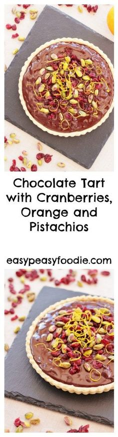 chocolate tart with cranberries, orange and pistachios on top