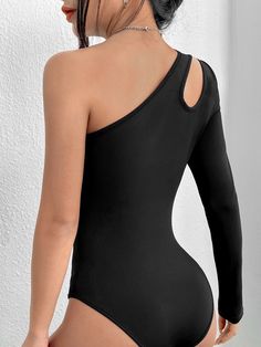 Indulge in this sleek and stylish One Shoulder Long Sleeve Slim Fit Bodysuit! This trendy bodysuit features a chic one-shoulder neckline with a trendy cut-out detail. Made from high-stretch fabric that hugs your curves perfectly, it's a must-have addition to your wardrobe. Specifications: Pattern Type: Plain Type: Tee Neckline: One Shoulder Details: Cut Out Sleeve Length: Long Sleeve Sleeve Type: Regular Sleeve Waist Line: Natural Fit Type: Slim Fit Fabric: High Stretch Composition: 90% Polyeste Solid One-shoulder Lined Bodysuit, One Shoulder Fitted Bodysuit With Lined Body, Fitted One-shoulder Bodysuit With Lined Body, One-shoulder Fitted Bodysuit With Lined Body, Fitted One-shoulder Bodysuit, Black Off-shoulder Stretch Bodysuit, Black Stretch Off-shoulder Bodysuit, Asymmetrical Stretch Solid Color Bodysuit, Asymmetrical Stretch Solid Bodysuit